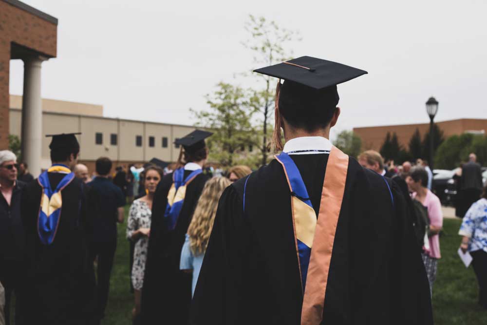 Graduate in cap and gown