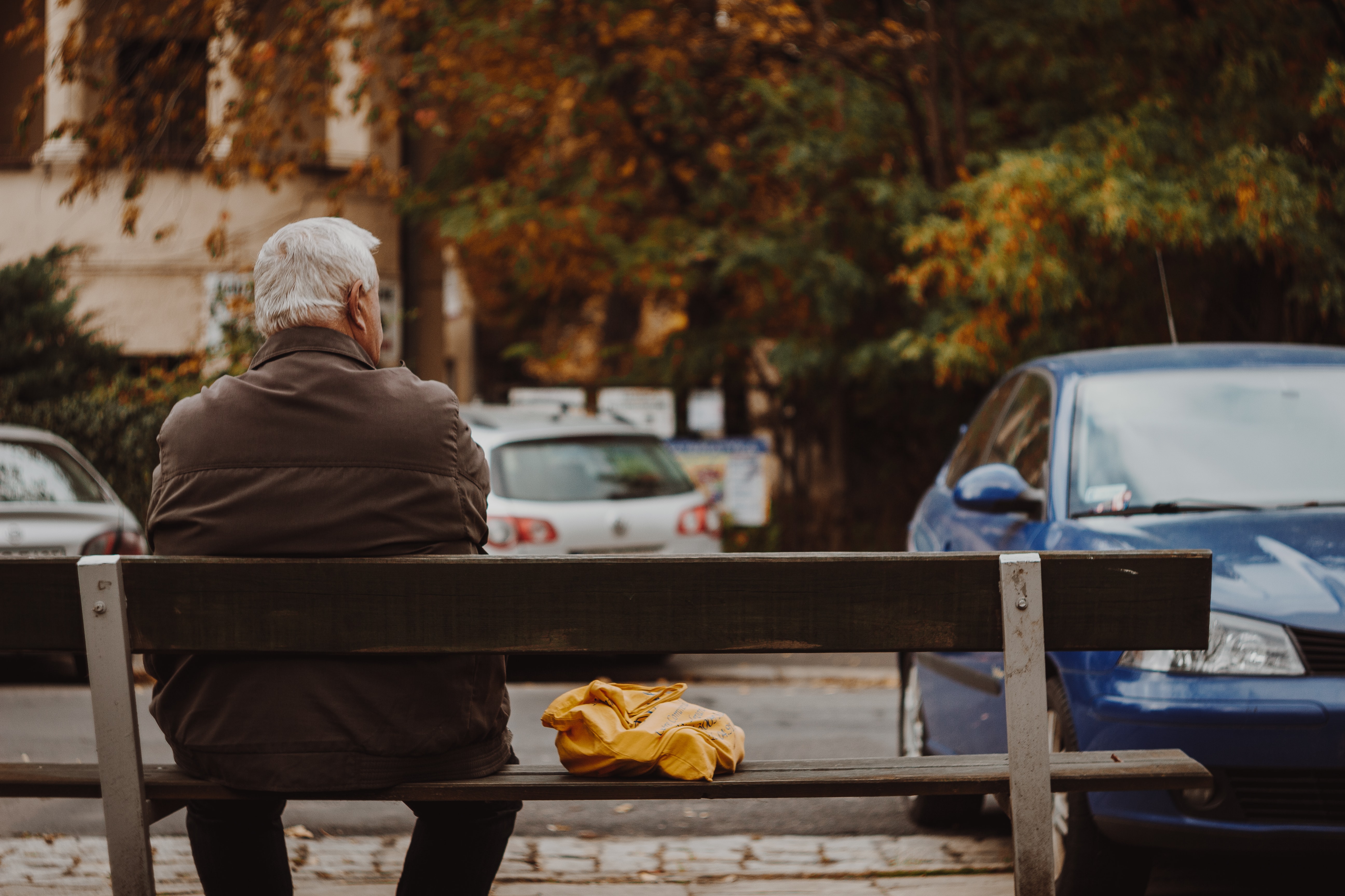 Man sitting on bench.