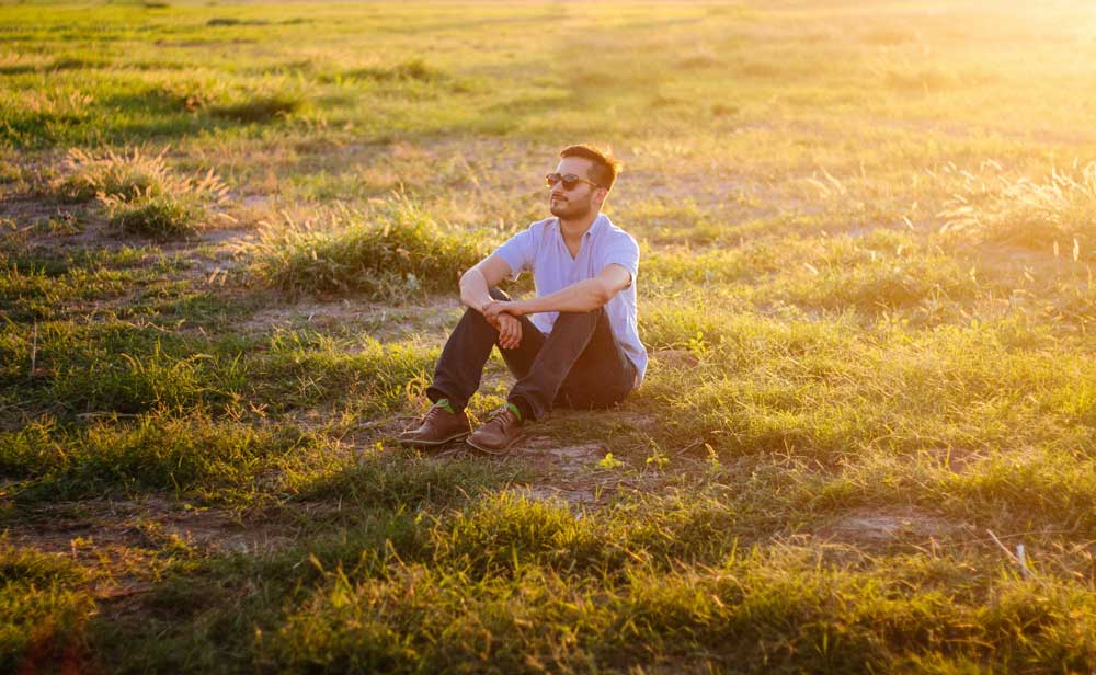 Man sitting in a field